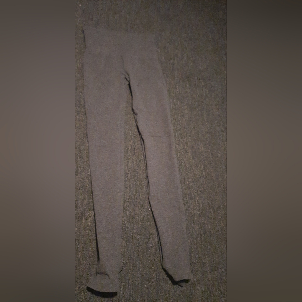 Dark gray compression leggings with foot holes